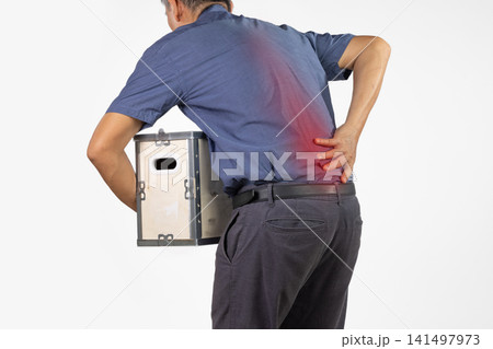 Senior man feeling backache because lifting weight box. 141497973