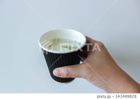 green tea or matcha green tea, milk green tea or matcha latte or matcha green tea latte in the paper glass green tea or matcha green tea, milk green tea or matcha latte or matcha green tea latte in the paper glass 141499928
