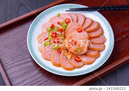 sliced pork sausage salad seasoned with chili oil and garlic sliced pork sausage salad seasoned with chili oil and garlic 141500222