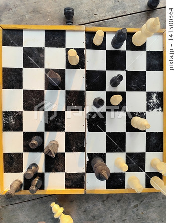 photo of chess pieces and board photo of chess pieces and board 141500364