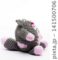 Knitted  cat on a white background 141500706