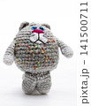 Knitted  cat on a white background 141500711