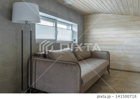 Mezzanine Floor Interior with Sofa and Floor Lamp 141500718
