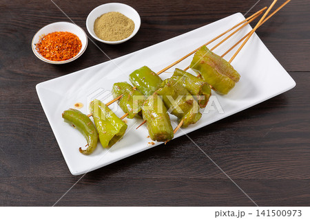 salt Grilled Green Chili Pepper Traditional Asian Vegetable Snack salt Grilled Green Chili Pepper Traditional Asian Vegetable Snack 141500973