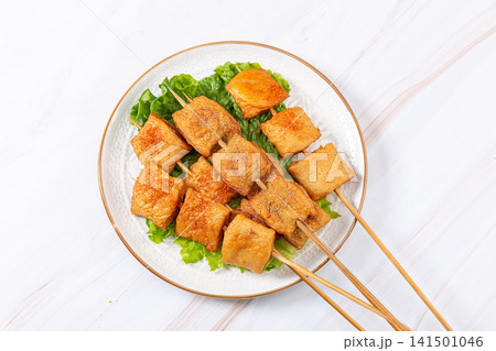 grilled Spicy Stuffed Tofu Pouch Skewers with Chili Seasoning grilled Spicy Stuffed Tofu Pouch Skewers with Chili Seasoning 141501046