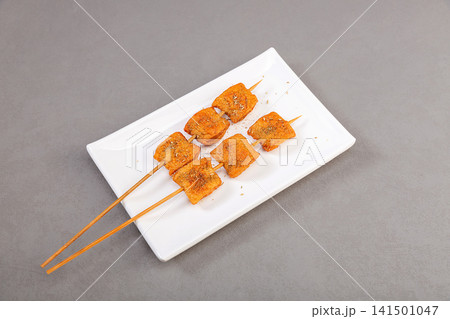grilled Spicy Stuffed Tofu Pouch Skewers with Chili Seasoning grilled Spicy Stuffed Tofu Pouch Skewers with Chili Seasoning 141501047