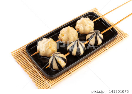 cooked Striped Cuttlefish Balls and Fish Meatballs on Skewers 141501076