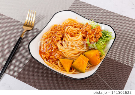 classic Italian Spaghetti Pasta With Rich Tomato Meat Sauce And Fresh Lettuce classic Italian Spaghetti Pasta With Rich Tomato Meat Sauce And Fresh Lettuce 141501622