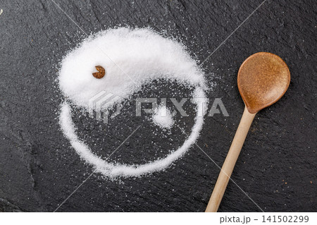 fine white sea salt granules shaped into a traditional Yin Yang Tai Chi symbol, pure mineral culinary seasoning. fine white sea salt granules shaped into a traditional Yin Yang Tai Chi symbol, pure mineral culinary seasoning. 141502299