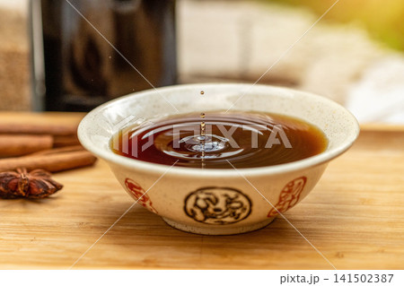 traditional Tianjin Duliu rice vinegar fermented Chinese condiment for Asian cuisine traditional Tianjin Duliu rice vinegar fermented Chinese condiment for Asian cuisine 141502387