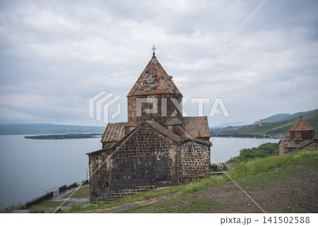 Medieval Sevanavank church on a hill next to Lake Sevan in Armenia with copy space Medieval Sevanavank church on a hill next to Lake Sevan in Armenia with copy space 141502588