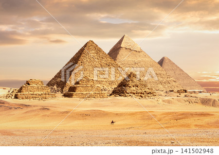 Majestic Great Pyramids of Giza at sunset, Cairo, Egypt Majestic Great Pyramids of Giza at sunset, Cairo, Egypt 141502948