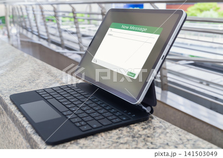 Tablet with email message application on keyboard case, digital communication and mobile technology 141503049