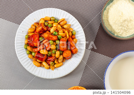 spicy crispy chili pepper crusts mixed with roasted peanuts snack spicy crispy chili pepper crusts mixed with roasted peanuts snack 141504096