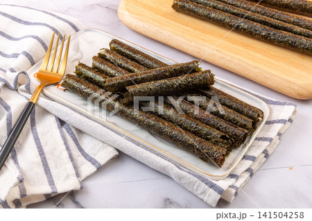 crispy Roasted Seaweed Rolls Savory Nori Snack Sticks crispy Roasted Seaweed Rolls Savory Nori Snack Sticks 141504258