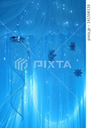 Magical Winter Wonderland Blue Backdrop with Lights and Snowflakes Magical Winter Wonderland Blue Backdrop with Lights and Snowflakes 141506138