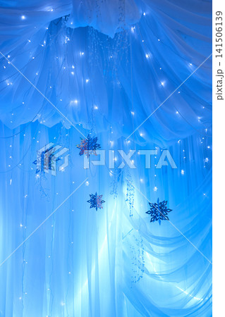 Magical Winter Wonderland Blue Backdrop with Lights and Snowflakes 141506139