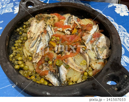 Traditional Moroccan Sardine Tagine with Vegetables 141507033