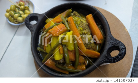 Moroccan Meat Tagine with Carrots and Green Beans 141507037