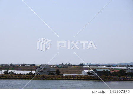 April 26 2026 Shin Aomori rural fields with coastal town, Japan April 26 2026 Shin Aomori rural fields with coastal town, Japan 141507376