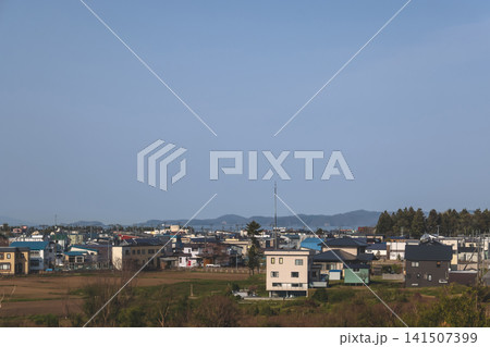 April 26 2026 Shin Aomori industrial buildings with mountains and clear sky April 26 2026 Shin Aomori industrial buildings with mountains and clear sky 141507399