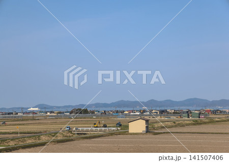 April 26 2026 Shin Aomori rural fields with coastal town, Japan 141507406