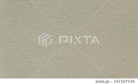 Full frame close up of a light beige wall with a coarse, pebbled finish resembling sand or fine stucco, with slight shading variations from the texture. 141507539