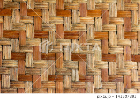 Close up of brown color wooden weave texture background Close up of brown color wooden weave texture background 141507893