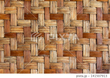 Close up of brown color wooden weave texture background Close up of brown color wooden weave texture background 141507913