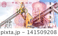 Collage of chinese yuan and crude oil pumps. Petroleum, petromoney and crude oil concept 141509208