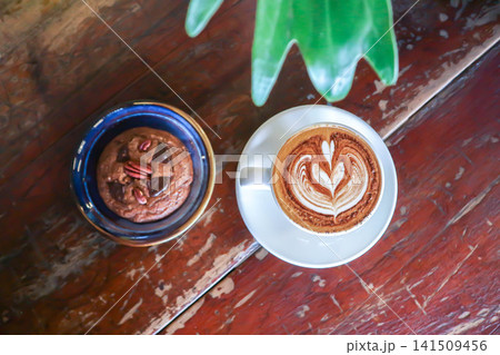 coffee or hot coffee, latte coffee or cappuccino coffee or mocha coffee and chocolate cookie 141509456