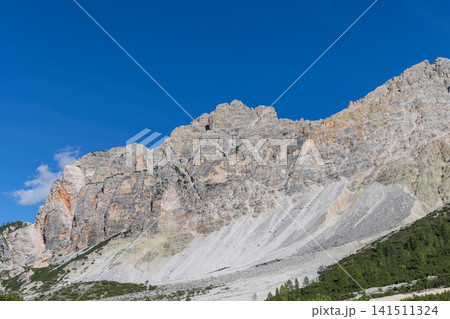 Col Bechei limestone cliffs and scree beneath deep blue sky in the Fanes Dolomites Col Bechei limestone cliffs and scree beneath deep blue sky in the Fanes Dolomites 141511324
