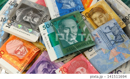 Kyrgyz banknotes of different denominations. Banknotes in 5000, 2000, 1000, 500, 200, 100, 50 and 20 som. Kyrgyz national currency. Kyrgyz banknotes of different denominations. Banknotes in 5000, 2000, 1000, 500, 200, 100, 50 and 20 som. Kyrgyz national currency. 141511694