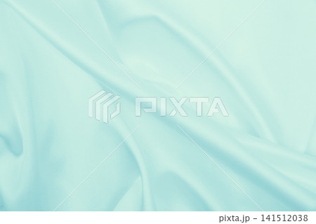 Smooth elegant blue silk or satin luxury cloth texture as abstract background. Luxurious background design Smooth elegant blue silk or satin luxury cloth texture as abstract background. Luxurious background design 141512038
