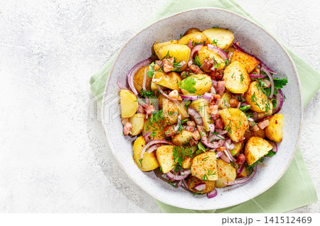 German potato salad, with bacon, onion and herbs, served in a bowl, homemade, no people, German potato salad, with bacon, onion and herbs, served in a bowl, homemade, no people, 141512469