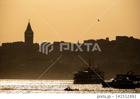 Sunset View of Galata Tower and Bosphorus Ship Traffic.  141512891