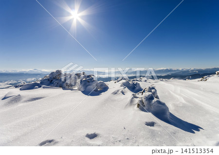 Snow covered winter mountains. Arctic landscape. Colorful outdoor scene, Artistic style post processed photo. Snow covered winter mountains. Arctic landscape. Colorful outdoor scene, Artistic style post processed photo. 141513354