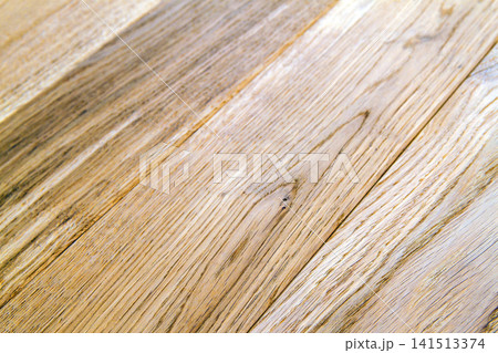 Several planks of beautiful laminate or parquet flooring with wooden texture as background Several planks of beautiful laminate or parquet flooring with wooden texture as background 141513374