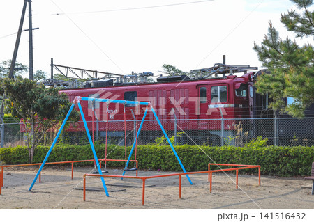 April 28 2026 Red electric locomotive passing suburban railway near Hitome Senbon Zakura 141516432