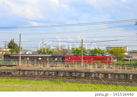 April 28 2026 Red electric locomotive passing suburban railway near Hitome Senbon Zakura 141516440