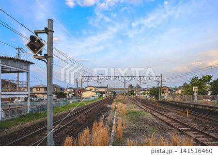 April 28 2026 Hitome Senbon Zakura railway corridor through suburban town with mountains April 28 2026 Hitome Senbon Zakura railway corridor through suburban town with mountains 141516460