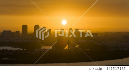 View from above of contemporary high skyscraper buildings in downtown district of Tampa city in Florida, USA at sunset. American megapolis with business financial district 141517185