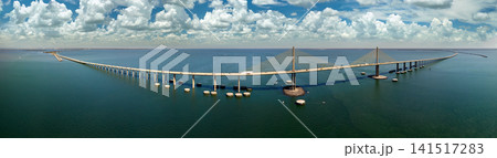 Sunshine Skyway Bridge over Tampa Bay in Florida with moving traffic. Concept of transportation infrastructure 141517283