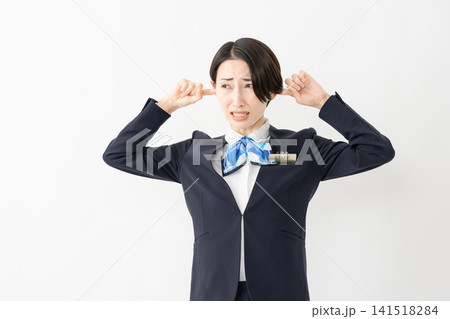 制服を着た受付係の女性 ジョブイメージ 制服を着た受付係の女性 ジョブイメージ 141518284
