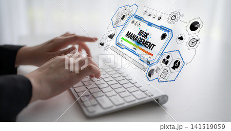 Hands Typing on Keyboard with Risk Management Graphics in Modern Office Setting for Business and Finance Concepts Quark Hands Typing on Keyboard with Risk Management Graphics in Modern Office Setting for Business and Finance Concepts Quark 141519059