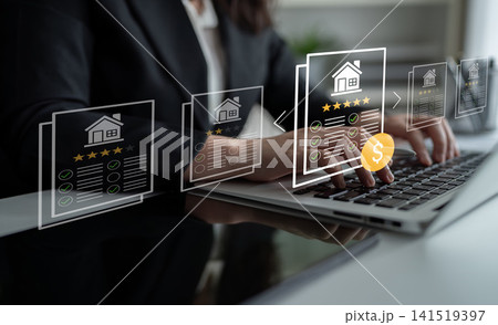 Businesswoman Analyzing Real Estate Listings on Laptop with Digital Graphics of Ratings and Pricing Information Ledger Businesswoman Analyzing Real Estate Listings on Laptop with Digital Graphics of Ratings and Pricing Information Ledger 141519397