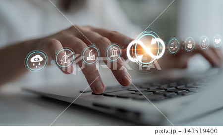Hands Typing on Laptop with Digital Icons Representing Sustainability, Technology, Finance, and Law in Modern Office Environment. Sentient Hands Typing on Laptop with Digital Icons Representing Sustainability, Technology, Finance, and Law in Modern Office Environment. Sentient 141519400