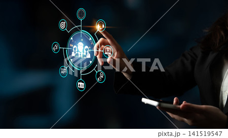 Businesswoman Interacting with Digital Icons on Smartphone, Representing Technology, Connectivity, and Innovation in a Modern Office Environment Fluxor Businesswoman Interacting with Digital Icons on Smartphone, Representing Technology, Connectivity, and Innovation in a Modern Office Environment Fluxor 141519547
