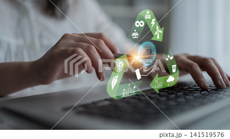 Sustainability and Eco-Friendly Practices Represented with Hands on Laptop, Recycling Symbols and Earth Icons for Environmental Awareness Promotion Quark 141519576