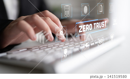 Close-Up of Hands Typing on a Keyboard with Digital Security Concept and Zero Trust Graphics in a Modern Office Environment Fluxor Close-Up of Hands Typing on a Keyboard with Digital Security Concept and Zero Trust Graphics in a Modern Office Environment Fluxor 141519580